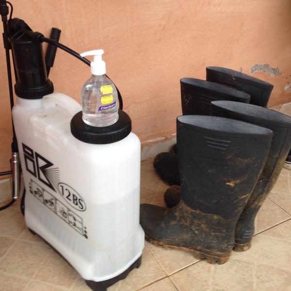 bcsolomon's tweet photo. The first defense against #ebola: rubber boots, hand sanitizer, chlorine. (Not pictured: vigilance and common sense) http://t.co/WMccSOJApr