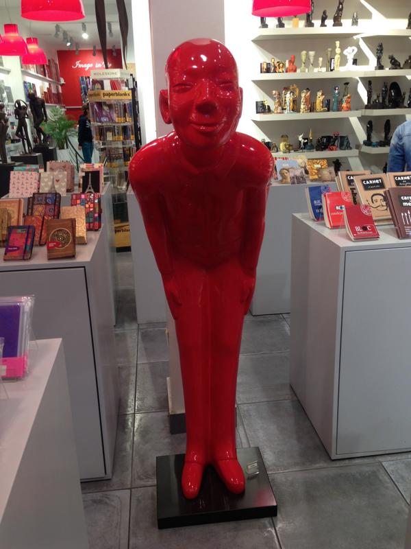 bluewhite's tweet photo. Cool red man bowing and giving respect near centre pompidou in Paris #paris http://t.co/9IEipUgawa