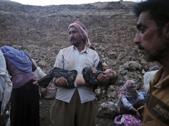 "They're terrified and exhausted," <a href="/moises_saman/">moises saman</a> photographs Yazidi refugees in Iraq <a href="/TIME/">TIME</a> ti.me/1vvy4WW