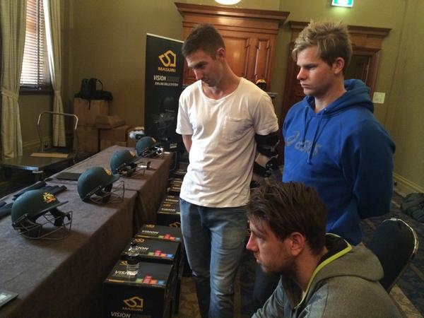 cricketcomau's tweet photo. .@shaunmarsh9, @stevesmith49 and @_jamespattinson checking out the new range of @MasuriOfficial helmets #playercamp http://t.co/ufLasIbfl6