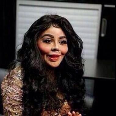 strictlymale's tweet image. Lil Kim looks like someone from the Purge
