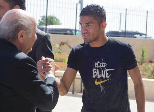 FootballFunnys's tweet photo. 20 yr old footballer Mohammad al-Qatari was shot dead by Israeli forces on Friday. Pictured meeting Sepp Blatter. RIP http://t.co/CDHi37kgg2