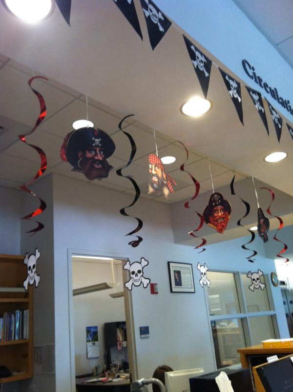 OlinCollegeLib's tweet photo. Shark Week?  Try Pirates! Lyra, our arrrmazing student worker has created a reading contest. Stay tuned for details! http://t.co/a6H1e2VdUx