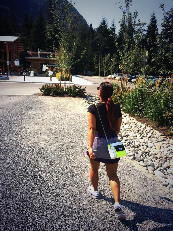 Here's @OTP4U on her way up a mountain with her neon @MichaelKors cross body bag #whynot #adventureinstyle