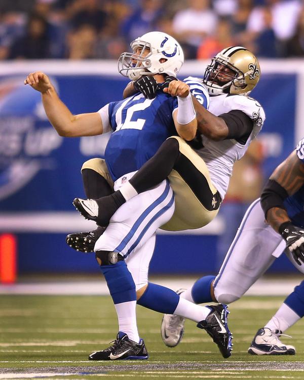 zkeefer's tweet image. What a photo. RT @MattKryger: @Colts Andrew Luck gives a piggyback ride to @Saints @JuniorG93.