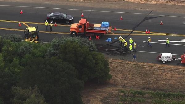abc7newsbayarea's tweet photo. Road crews working to fix this crack on State Route 121 in Napa. #quake #SouthNapaQuake http://t.co/T83lqVEvSy