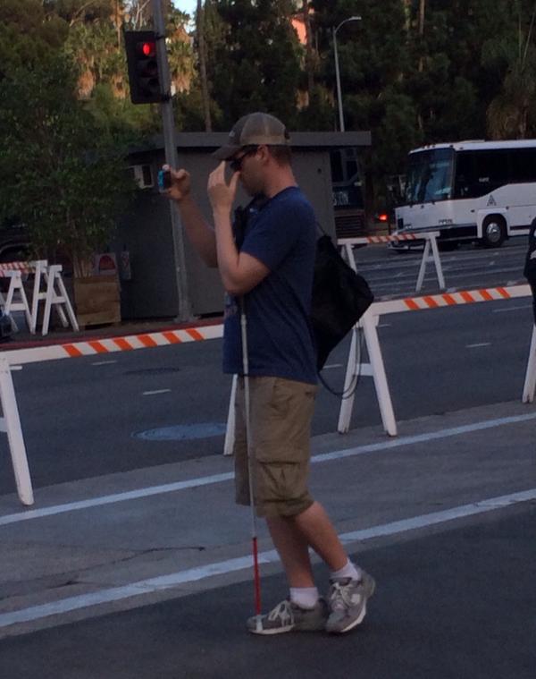 deandelray's tweet image. Blind guy taking photos #WTF