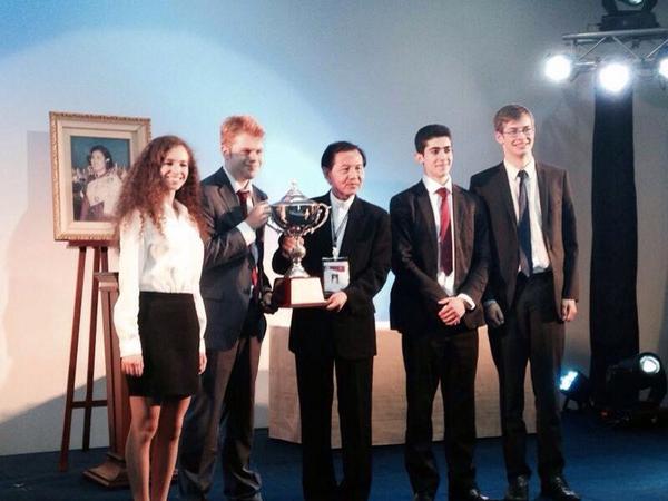 Debate_Q's tweet photo. Team England accepting their cup as winners of World Schools Championships 2014 #wsdc #wsdc2014 http://t.co/Es0Fa0JJXw