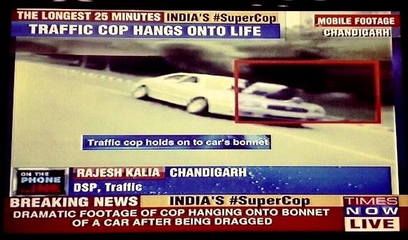 TimesNow's tweet photo. On The Newshour catch the discussion on the heroics of India's #SuperCop who chased down a rogue driver in Chandigarh http://t.co/S7gRbk4HRk