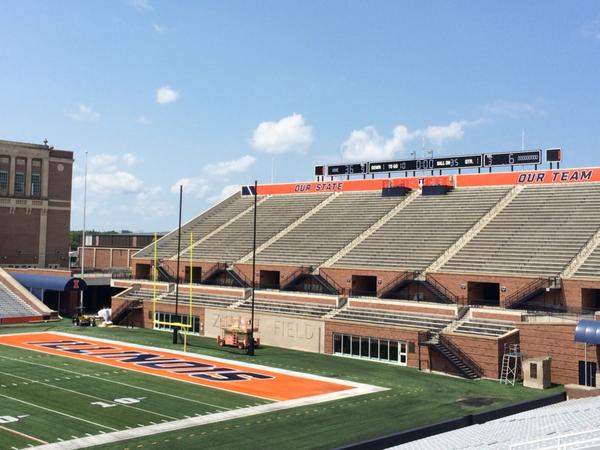IlliniAthletics's tweet photo. Memorial Stadium end zones &amp; graphics getting a little touchup while @IlliniFootball is at #CampRantoul! #rebrand http://t.co/q3BhVv3gRg