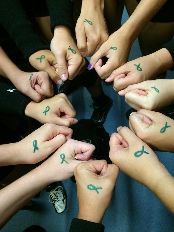 Lady Pirate Volleyball players showing their support for classmate Briggs Berry during Pearland tournament.