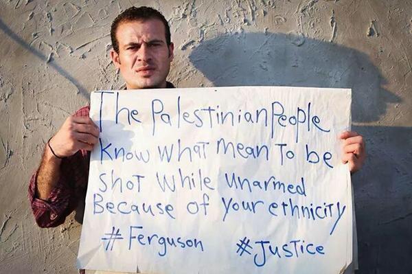 MMmarco0's tweet photo. Palestinians in #Gaza/West Bank have been showing support for #Ferguson.  http://t.co/qAH0u2GPPA