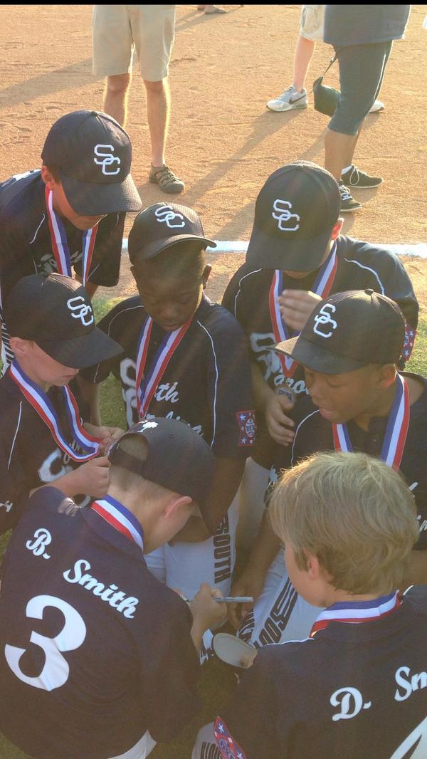 2014DYWS's tweet photo. SC AAA team signing a game ball for "Spud" their Host Brother.  @FarleyWeather http://t.co/rKen6I1y7q