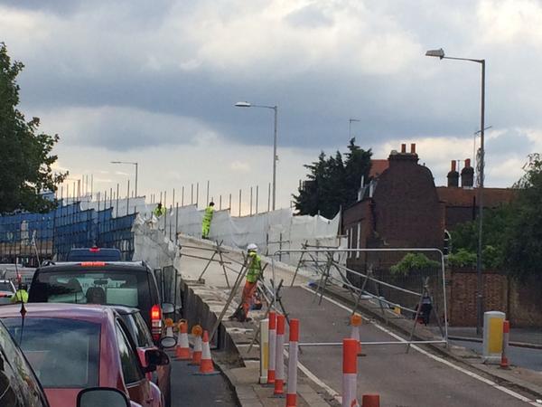 This is the state of civil engineering in this country, 3 guys standing doing sweet FA, it's 2014 for gods sake