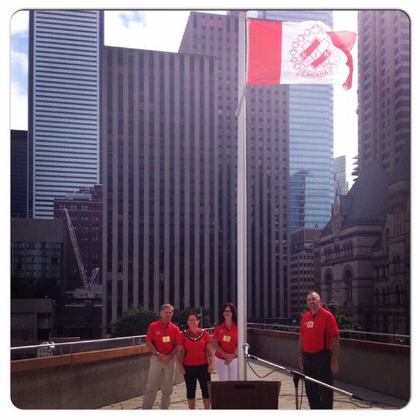 KinCanada's tweet photo. Ric, Mel, Penny &amp; Ron raise the Kin Flag at Toronto City Hall. #kinvention #kincanada http://t.co/V1Ii80KuRE