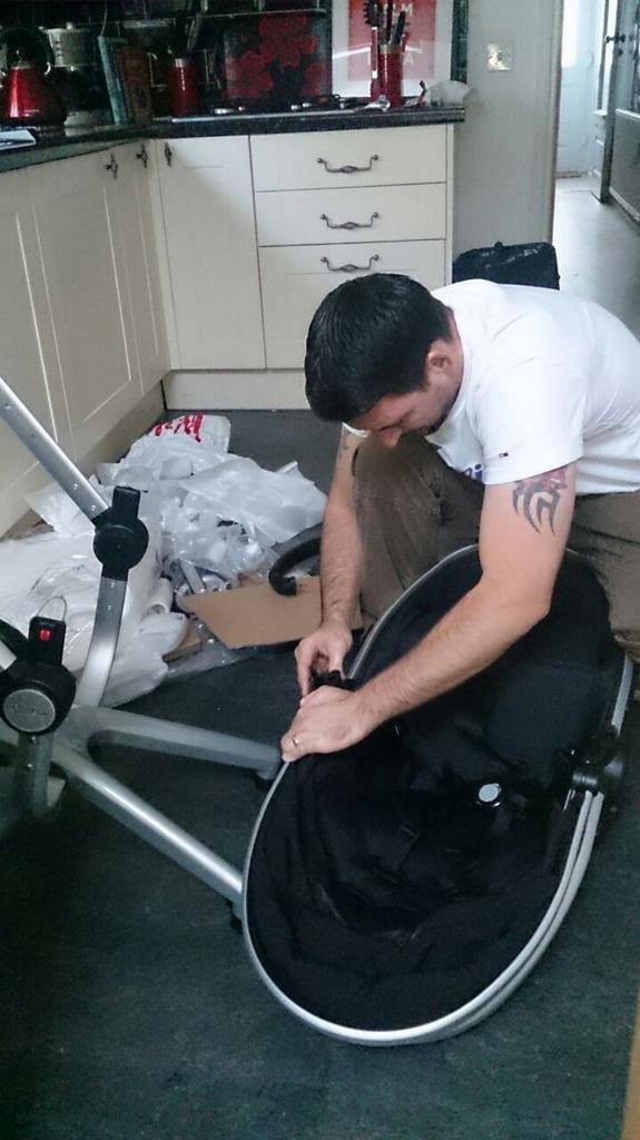 Gerbil1986's tweet image. 12 years in the army has not prepared him for a baby!!! #armyprep #babyready #confusedman