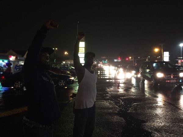 AntonioFrench's tweet image. Rain, demonstration, and celebration in #Ferguson tonight
