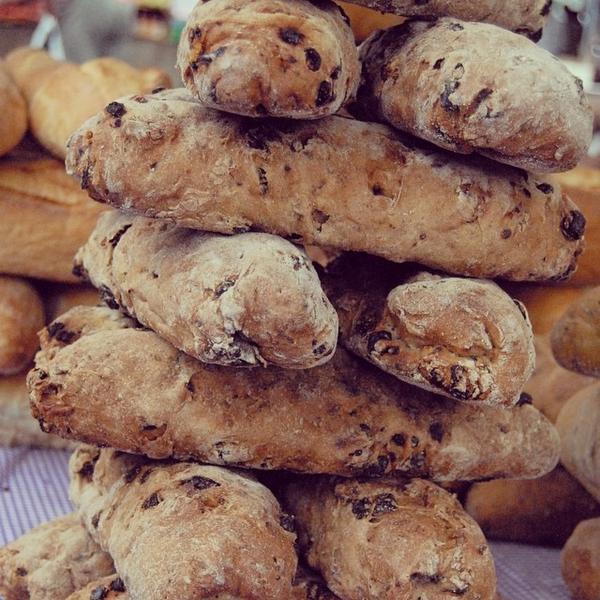 pickles_pears's tweet photo. Stack of gorgeous #olive #bread at the #farmers #market today. #farmersmarket #foodie #foodporn #dough #fresh #local http://t.co/msAbRNn0vw