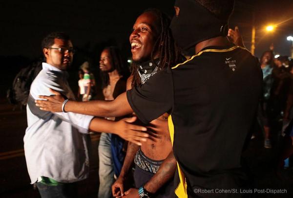 AntonioFrench's tweet image. Then another standoff. Myself and others tried to hold back the crowd. I pleaded for both sides to stand down.