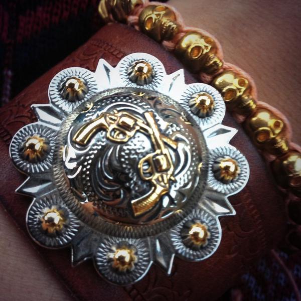 LauraWalshMusic's tweet photo. Wearing my newest cuff at tonight's show - huge thanks to @casualcuffs I love it!!! #cuffitup 🔫💀❤ http://t.co/5o7PSdG9uH