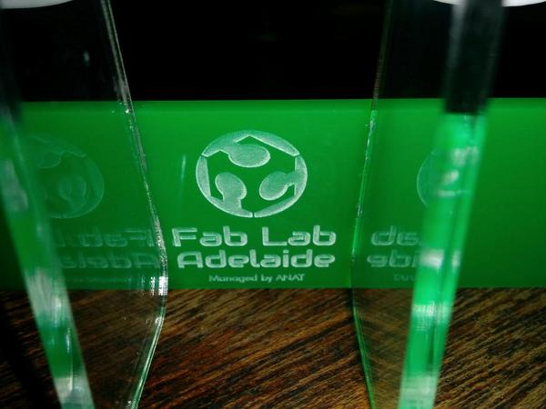 DataForChange's tweet photo. Thank you @FabLabAdl for the amazing @unleashedADL trophy! 3D printed, laser cut, handmade goodness! http://t.co/xQGfYZCQxF