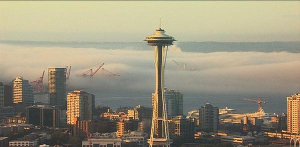 KING5Seattle's tweet photo. Beautiful shot of Seattle this morning w/ a little fog around. Send us your photos http://t.co/nwreIJXmMn  #K5Summer http://t.co/yDT4jsOECO