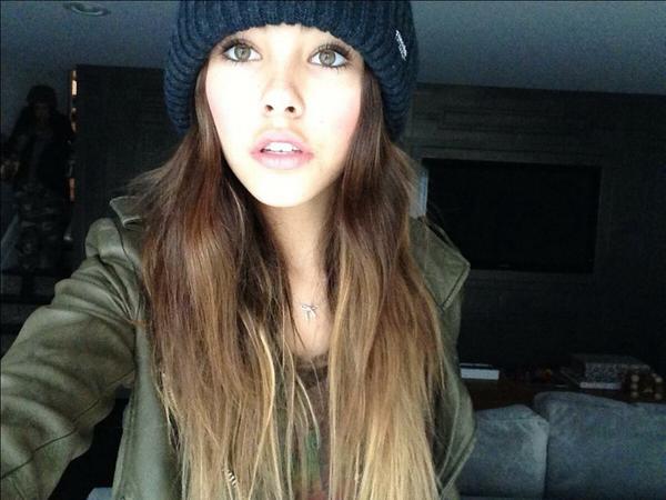 Why do I always take pictures with my lips parted? Why does it look like I have a pig nose? Tf