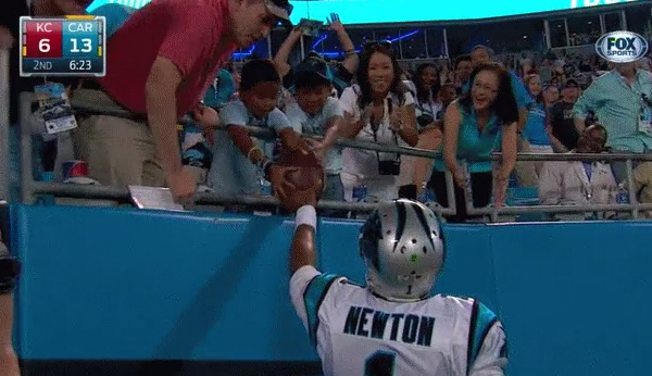 NFLCanada's tweet photo. "@NFLonFOX: Hooking up this little guy with the football after TD
by @Panthers QB Cam Newton. http://t.co/6bzcWMAdFX" #makefanshappy