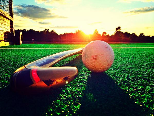 Sunset Over Field Hockey Arena with Equipment on Field Stock Photo - Image  of game, cheering: 93197948