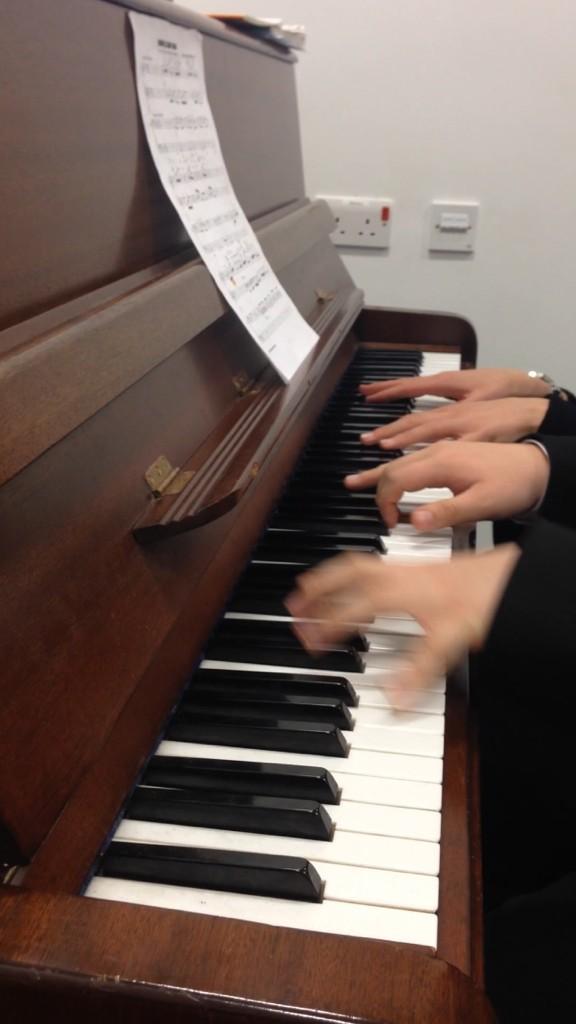 CAMusicDept's tweet photo. Conor and Nathan working on piano duets!  #morehandsmakemorenoise http://t.co/YTghx3Rodn