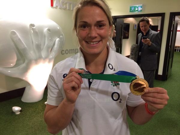EnglandRugby's tweet image. Here's @RachaelBurf12, still grinning 24 hours after #WRWC2014 victory. And no, she's not taken that medal off yet