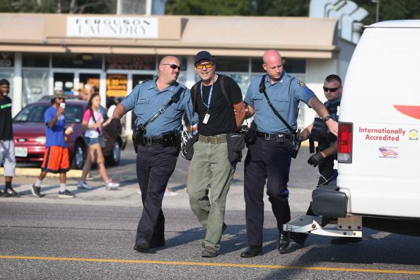 Getty photographer Scott Olson  arrested in #Ferguson tonight