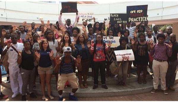 lostinthetrap's tweet photo. RT @WHOcanStop_mE: #HandsUpDontShoot #GSU #SouthernNotState #RIPMIKEBROWN http://t.co/fKD06KYlBZ