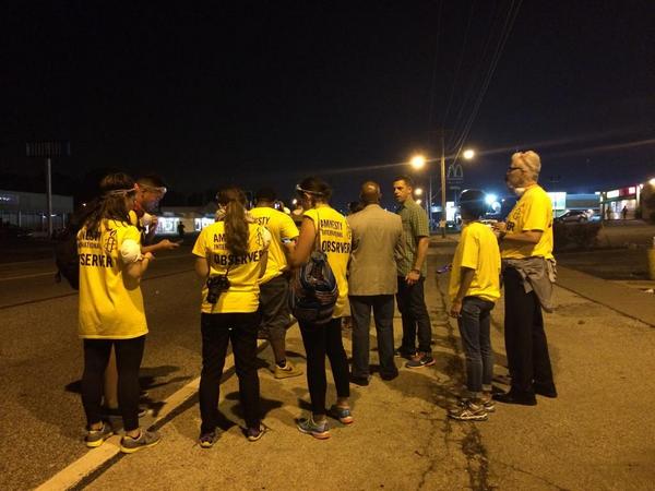 MrPooni's tweet photo. Holocaust survivors/Tibetan monks/Amnesty International/Crips/Bloods standing in solidarity with #Ferguson protestors http://t.co/YHWX3fEQzl