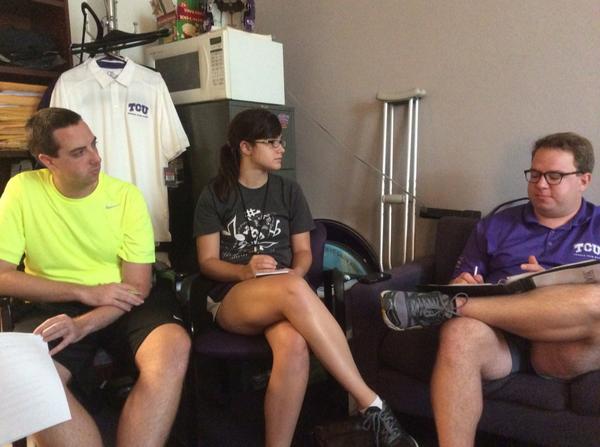 TCU drum majors working on in-game procedures. Sounds like they are speaking a dialect of English, but I am not sure.