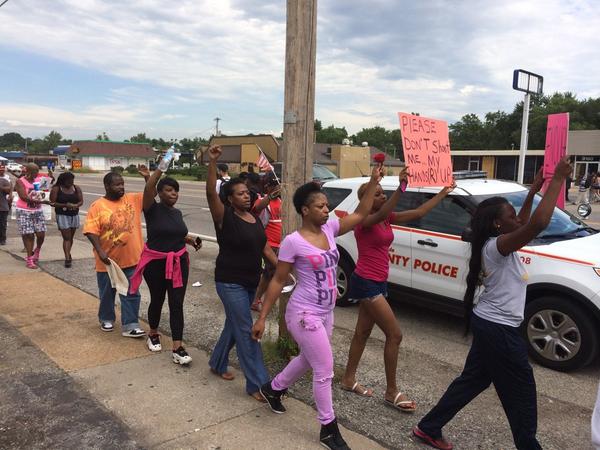 russellkinsaul's tweet photo. Small groups of peaceful protesters walk up &amp; down W Florissant in Ferguson. But what will happen tonight? #kmov http://t.co/NYTkL3bfDF