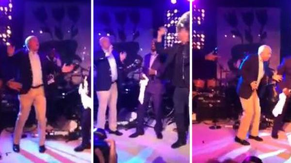 TMZ's tweet image. WATCH: John McCain goes full cyborg.... busts out the robot at Hamptons dance party tmz.me/Rv26mup