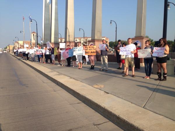 uneditedmedia's tweet photo. #justice 4 #mikebrown rally bridge between #fargo, #nd &amp; #moorhead, #mn #ferguson @GlobalRevLive http://t.co/javb1Na5YG