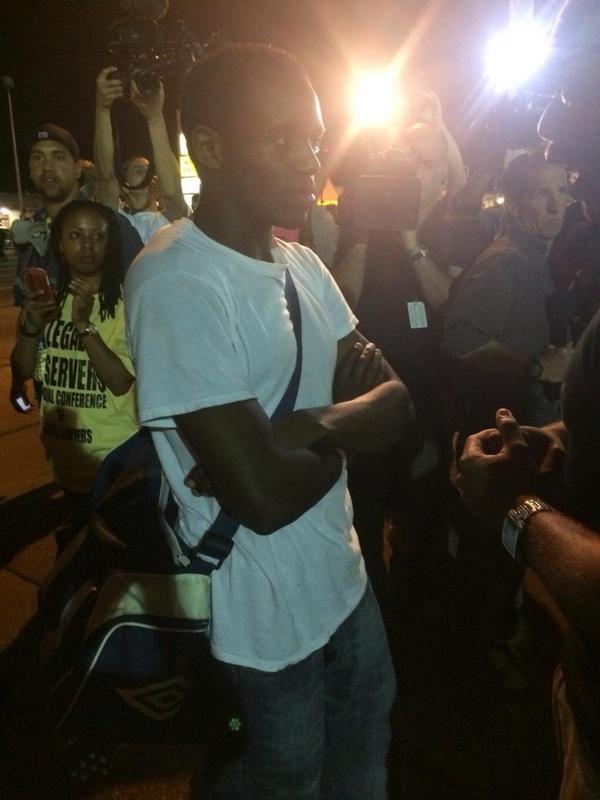 <a href="/NCBLawyers/">NCBL</a> Legal Observers in #Ferguson-bright yellow shirts w/legal observers National Conference of Black Lawyers
