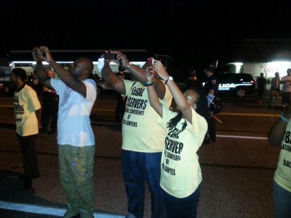 <a href="/NCBLawyers/">NCBL</a> photographing police show of force.  Very volatile -- #ferguson