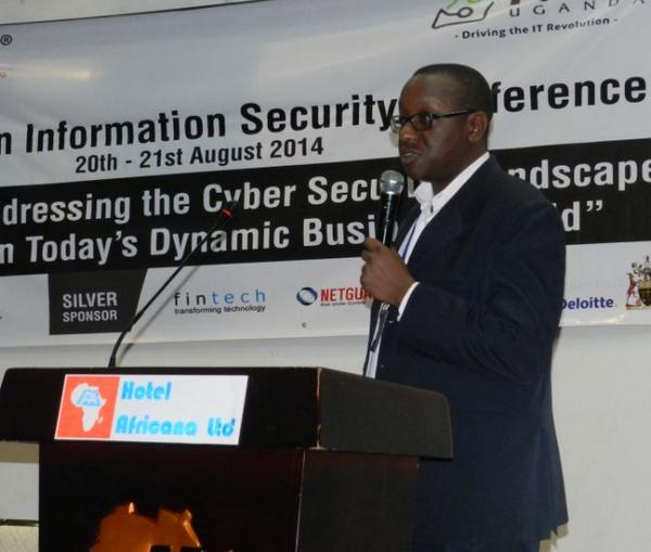 NITAUganda1's tweet photo. #EAISC Mr. Noah Mukasa, MD Computer Forensics Consults Ltd talking about securing mobile money environment. @CERT_UG http://t.co/nHusPGnYZ9