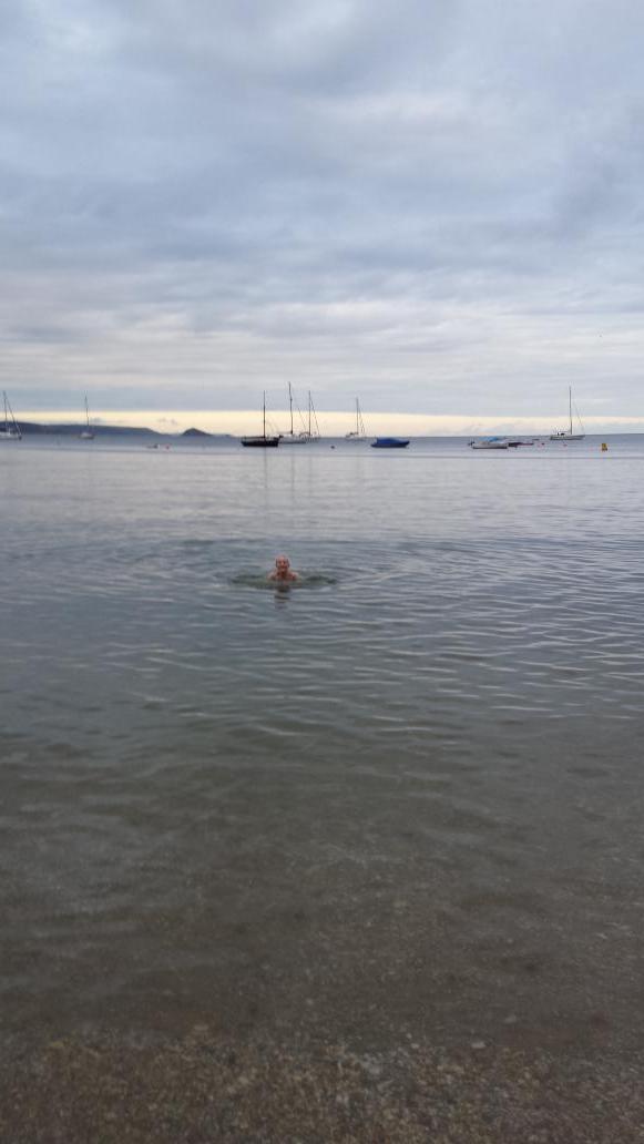 I GOT IN THE SEA I AM SO BRAVE IT WAS DEFINTELY NICE AND NOT AT ALL FREEZING COLD.