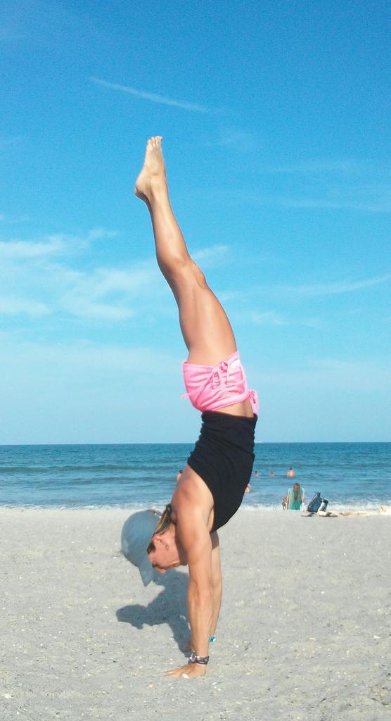 cyncamp's tweet photo. Handstand at Cocoa Beach FLA...oh yeah I did!!! A few pushups while inverted too. Why not? @gualy #handstandsarefun http://t.co/5OnYMCUMX0