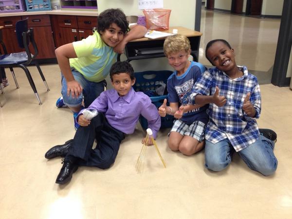 ldouce17's tweet photo. Team building in room 202...we had 2 teams build standing towers.  Such pride! #dweclassroom http://t.co/5oXN7X38y0