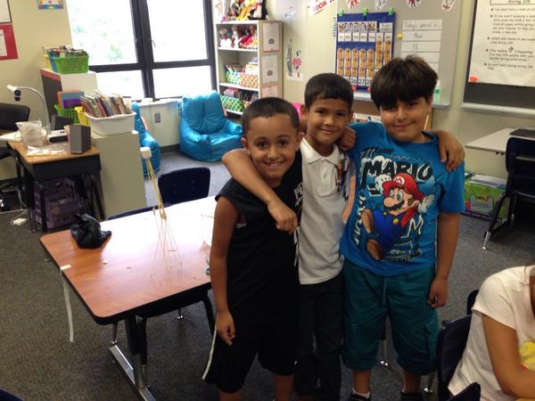 ldouce17's tweet photo. Team building in room 202...we had 2 teams build standing towers.  Such pride! #dweclassroom http://t.co/5oXN7X38y0