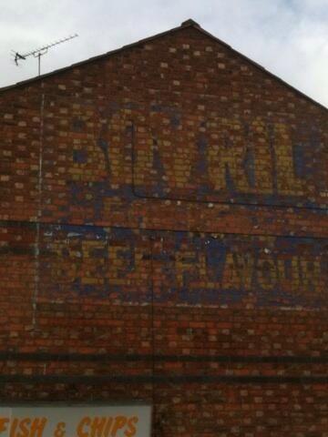 ThisChester's tweet photo. BEEF UP THE BOVRIL! Please restore this famous, faded Chester wall advert above the chip shop in South View Road. http://t.co/irE1fejSCA