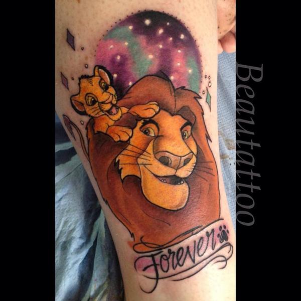 Marigold Adornment - Tattoo by @jes.mulcahy ・・・ Mid tattoo and finished  tattoo of a watercolor Simba! This was super fun to do 🦁 ... #lionking # simba #watercolor #tattoo #disney #hakunamatata #lioncub #lion #