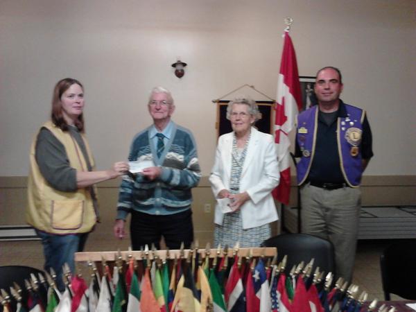 Lion President Cathy Weckwerth &amp; Lion Rob Brooks, Presented a Cheque to Gordon &amp; Marion Bethune, for NeighbourLink.