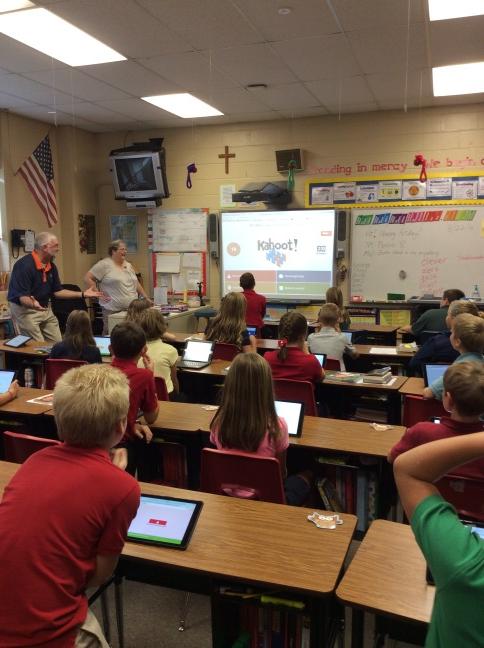 Kahoot's tweet image. Focused! "@missgraham10: 5z playing Kahoot while reviewing classroom procedures! @clschargers @DebZeckzer #clstech http://t.co/SBnGXZ58pR"