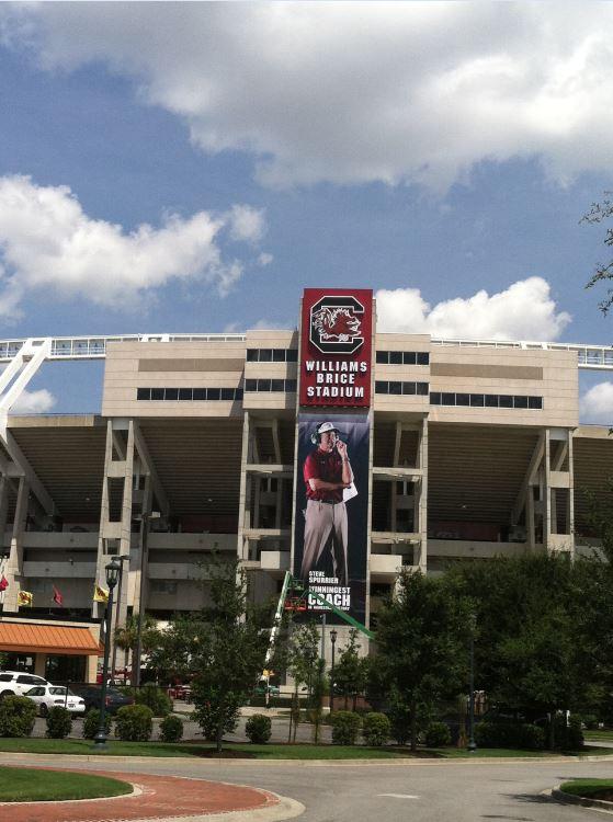 GamecocksOnline's tweet image. Latest views of the new Coach Spurrier banner on the side of Williams-Brice! #HBC #Gamecocks 5 days!